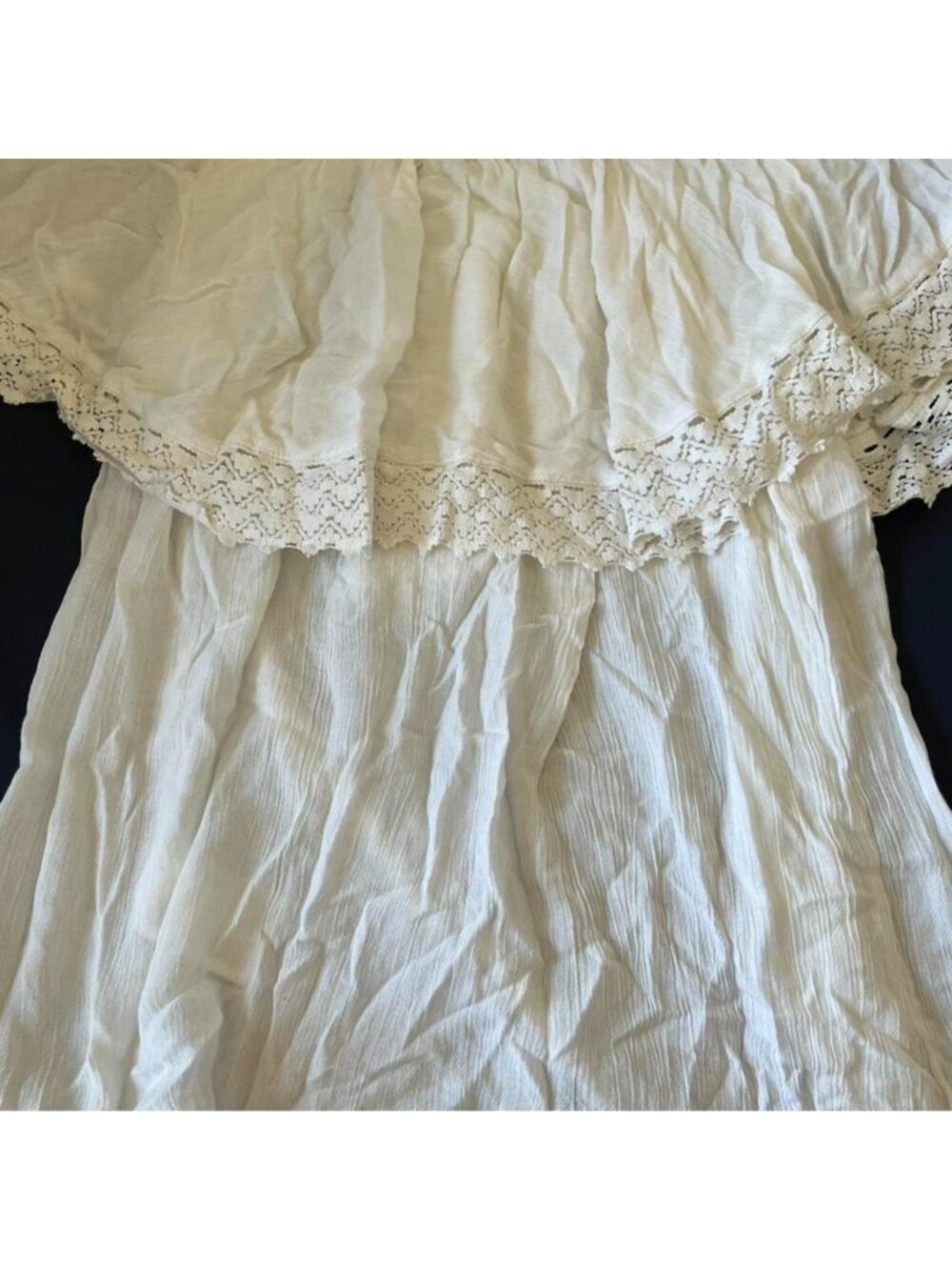 White lace babydoll top with ruffles and lace details. Size: 14